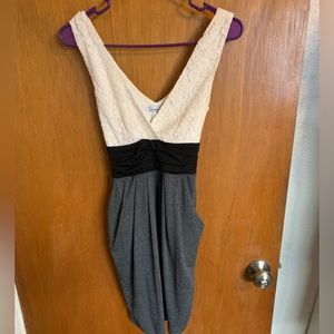 Super cute dress with black waist tie. Ivory lace top and soft cotton bottom.